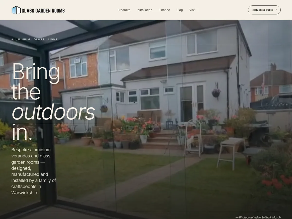 Glass Garden Rooms homepage — a photograph of an aluminium veranda over a garden, with the headline "Bring the outdoors in."